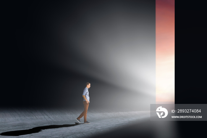 businessman walking to opened door