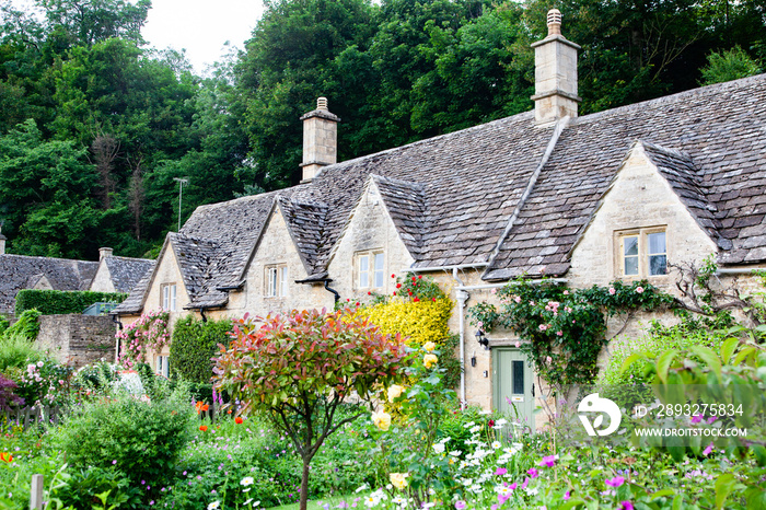 traditional Cotswold cottages in England, UK. Bibury is a village and civil parish in Gloucestershir