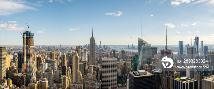 Midtown and downtown skyscrapers of New York cityscape view from rooftop Rockefeller Center