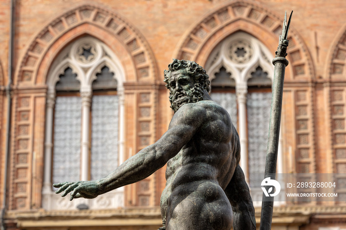 Bronze statue of Neptune (1566), Roman God, fountain in Piazza del Nettuno, and Palazzo dAccursio, 