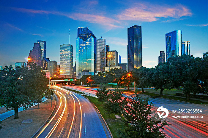 Skyline of the business district in Houston illuminated at dusk