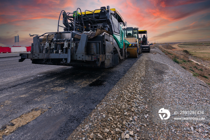 Asphalt machine at the construction site of a road