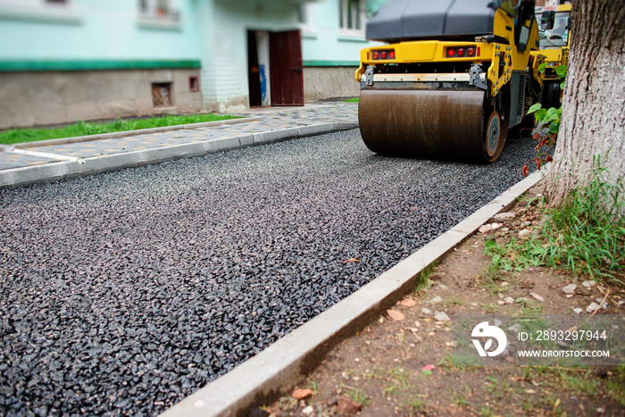 Background of asphalt roller that stack and press hot asphalt. Road repair machine