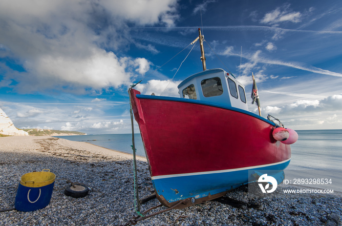 Traditional fisherman boat on beach in Beer, Devon,UK