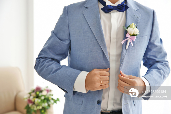 Groom on wedding day, closeup