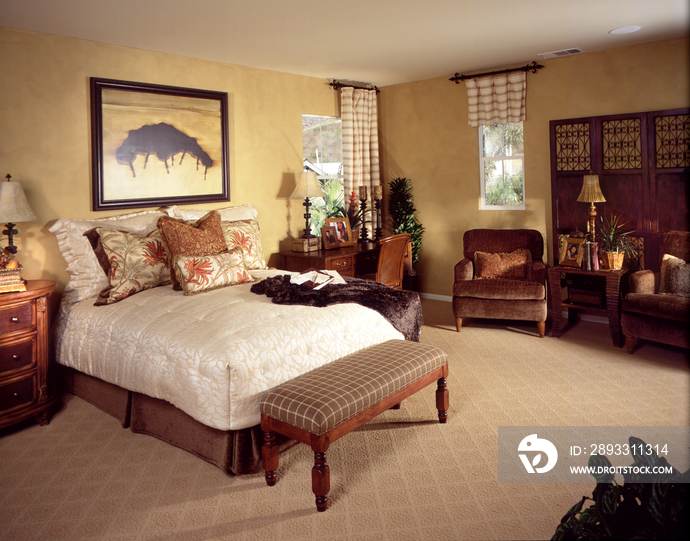 Interior of bedroom with end stool