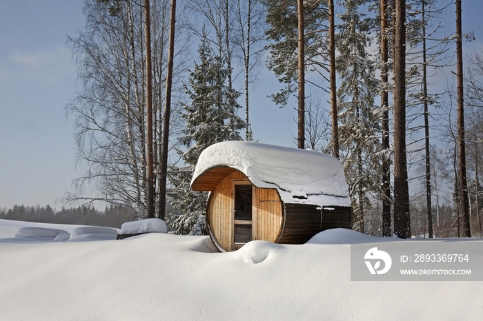 Round Barrel Sauna in the Snow