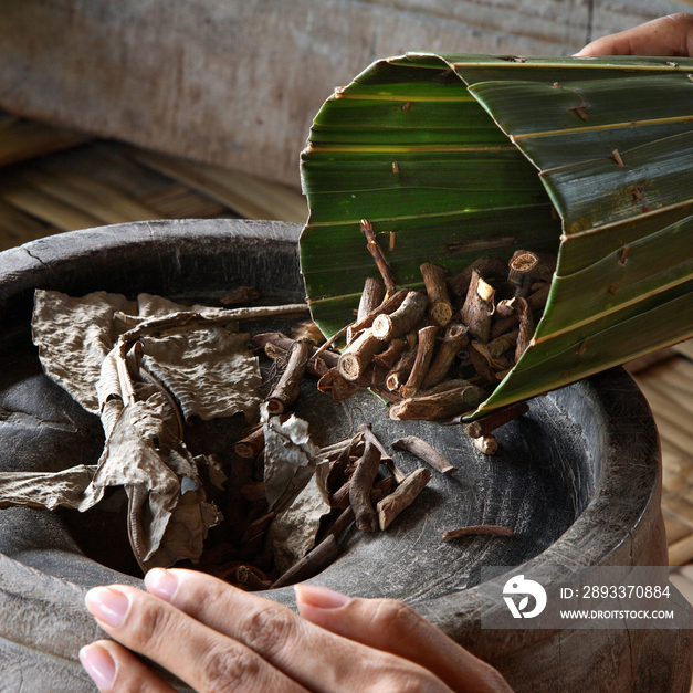 Woman with herbal medicine