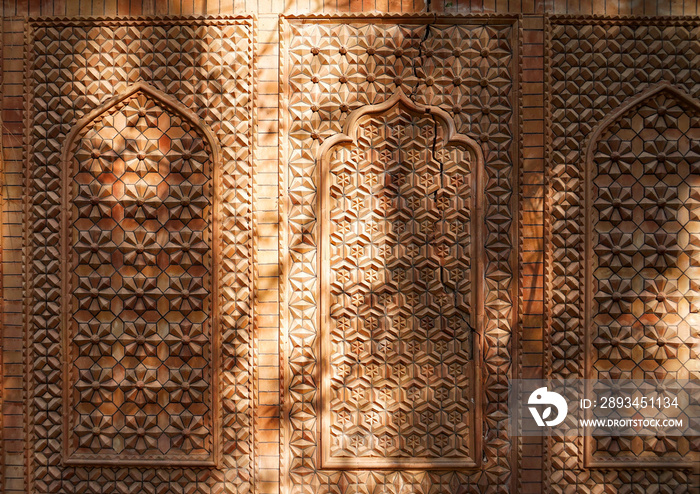 A decorative an ancient murals wall texture under sunlight