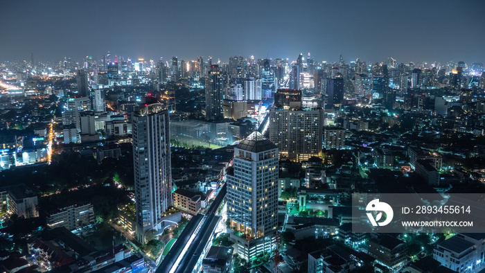 Business area in Bangkok, Thailand, showing buildings and traffic at night