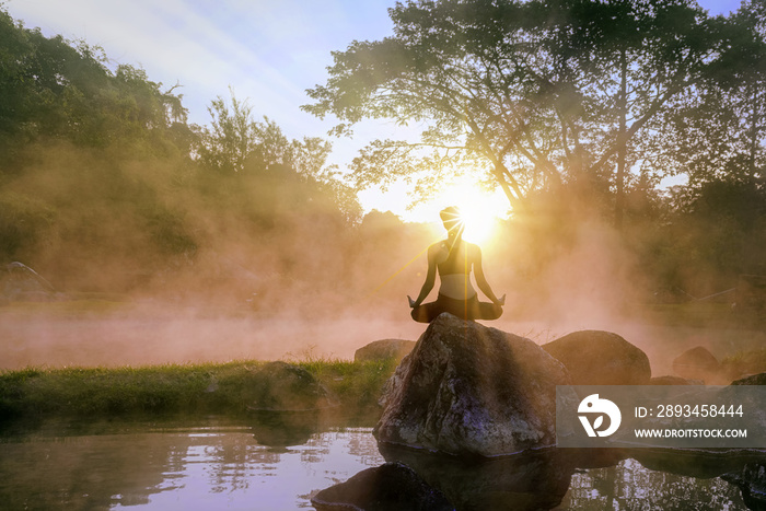 yoga woman in natural hot spring