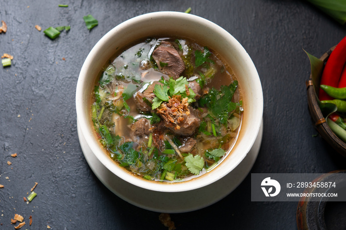 Bone soup in bowl.