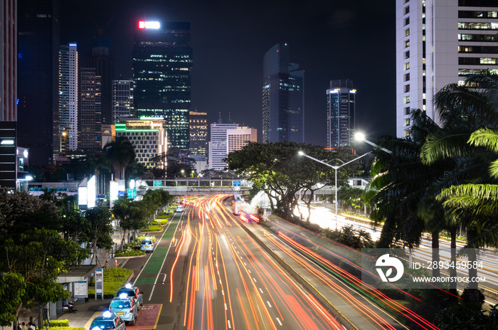 Traffic light trails in the modern business district in Jakarta, Indonesia capital city