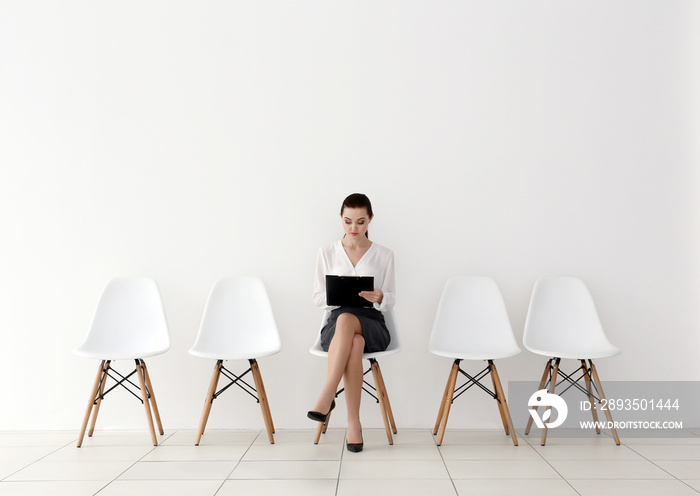 Young woman waiting for job interview