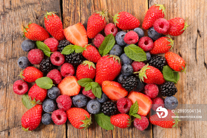 assorted of berry fruit- raspberry, strawberry, blueberry, blackberry