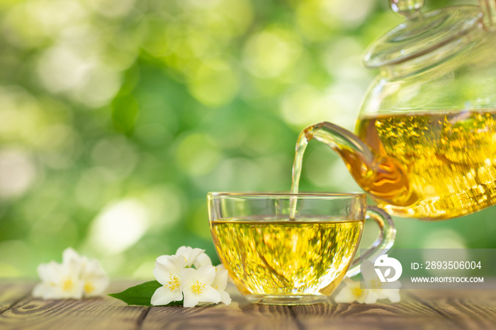 teapot and cup of jasmine tea