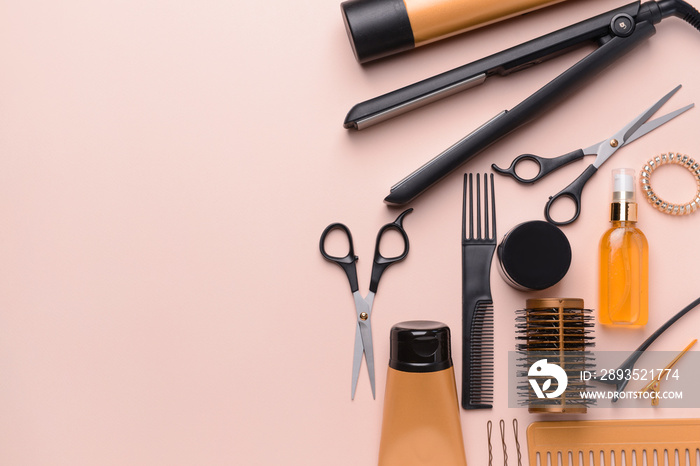 Set of hairdresser tools and accessories on color background