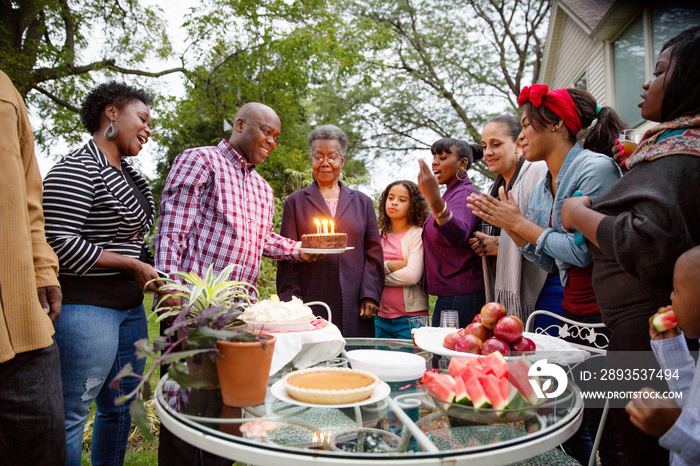 Family celebrating grandmothers birthday