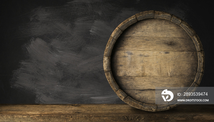 Old Wooden Beer Barrel on the Dark Background.