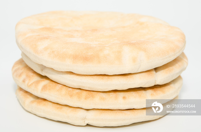 Pita flat bread isolated on white background