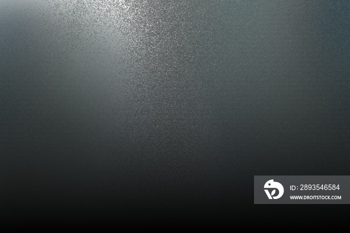Texture of rough gray metallic wall in dark room, abstract background