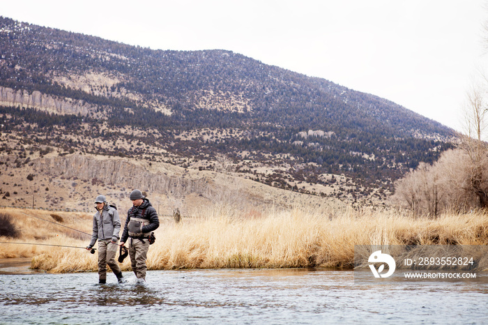 Two fishermen in stream