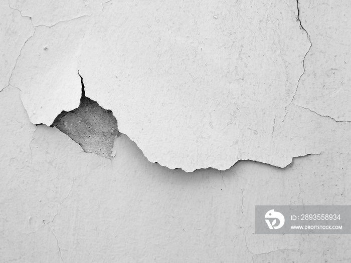 white wall with cracks