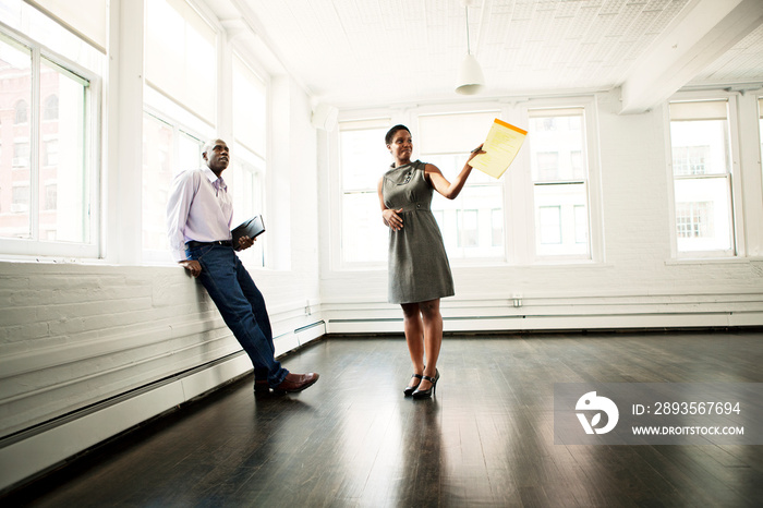 Man talking with real estate agent