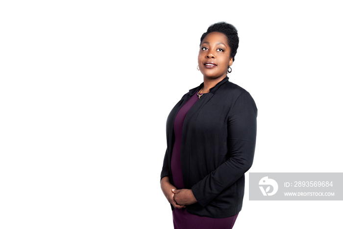 corporate African American business woman with an Afro is wearing jewelry and business attire for pr