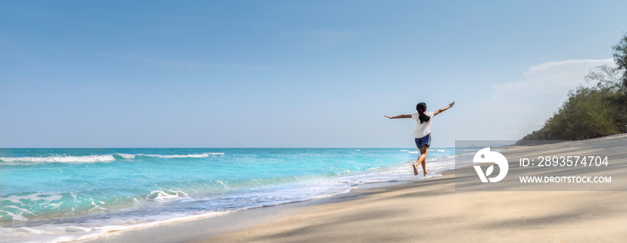 Summer vacations freedom life concept, Asian kid girl playing running arm flying on the beach with t