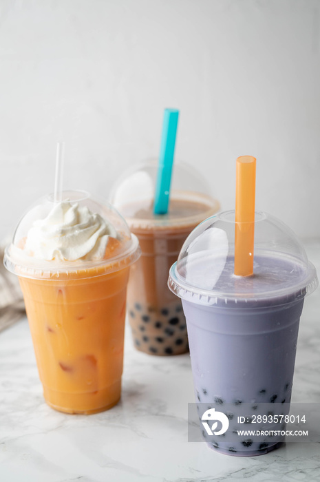 tapioca milk tea, taro potato tea, and thai tea