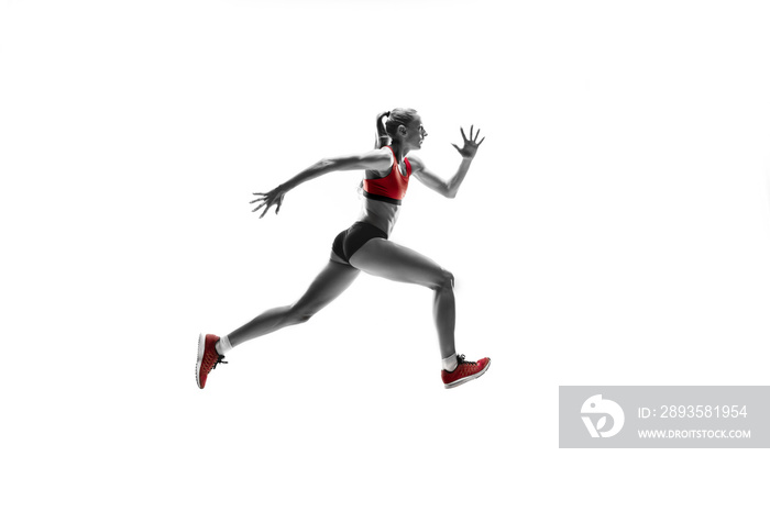 The one caucasian female silhouette of runner running and jumping on white studio background. The sp