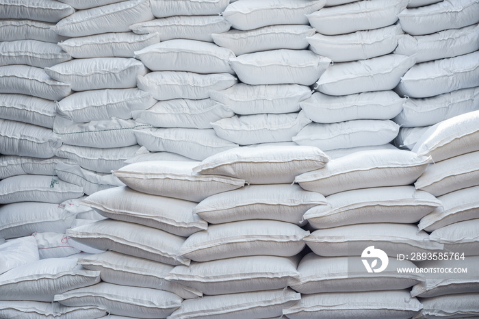 Stacking of wheat bags on truck move to warehouse.