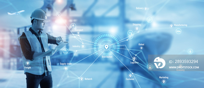 Worker using tablet on logistic network distribution and smart transportation on networking intellig