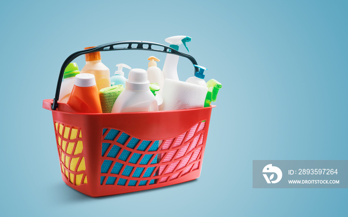 Red shopping basket with cleaning products