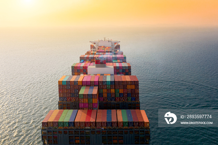 top aerial view of the large volume of TEU containers on ship sailing in the sea carriage the shipme