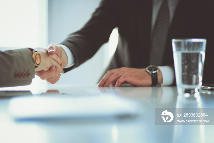 Portrait of businessman giving hand for handshake