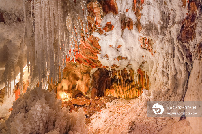 Old mine with white natural stalactites. Cardona Salt Mountain Cultural Park. Cardona, Spain.