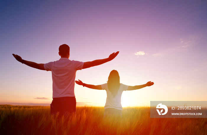 Couple feeling free in a beautiful natural setting.