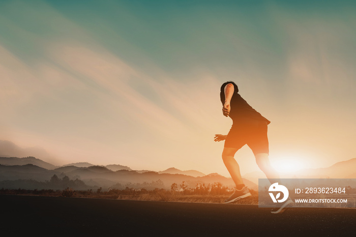 Young guy enjoy running outside with beautiful summer evening in the countryside.