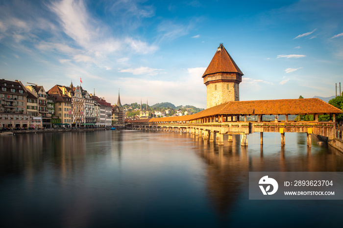 Sunset in historic city center of Lucerne with famous Chapel Bridge and lake Lucerne in Canton of Lu