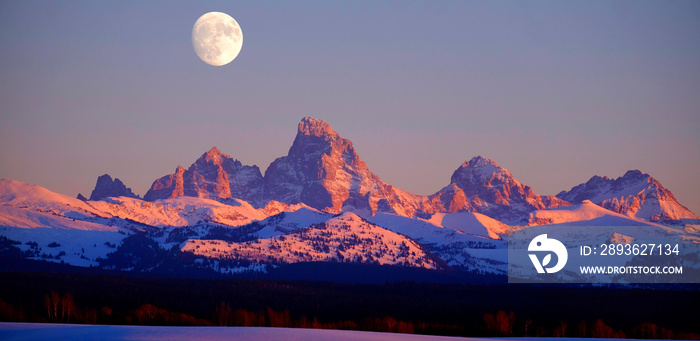 Sunset Light Alpen Glow on Tetons Teton Mountains wtih Moon Rising