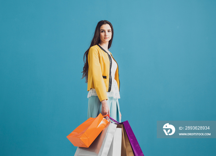 Fashionable woman with shopping bags