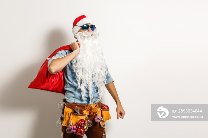 Santa Claus. Young Man with Christmas Gift Boxes Presents Emotional Having Fun Smiling. Handsome Spo