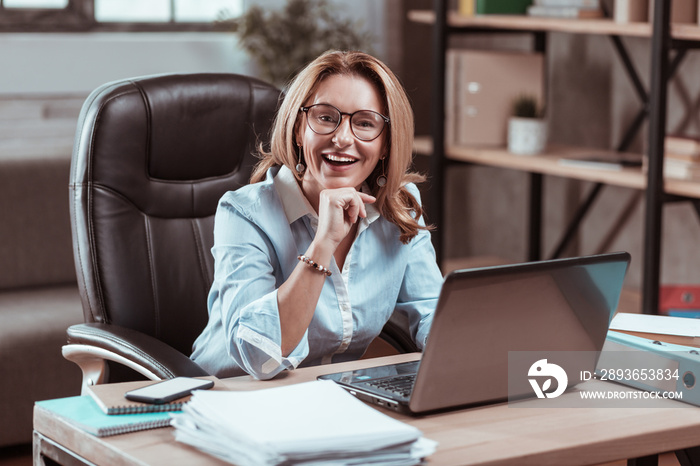 Pleasant experienced lawyer feeling excited before work