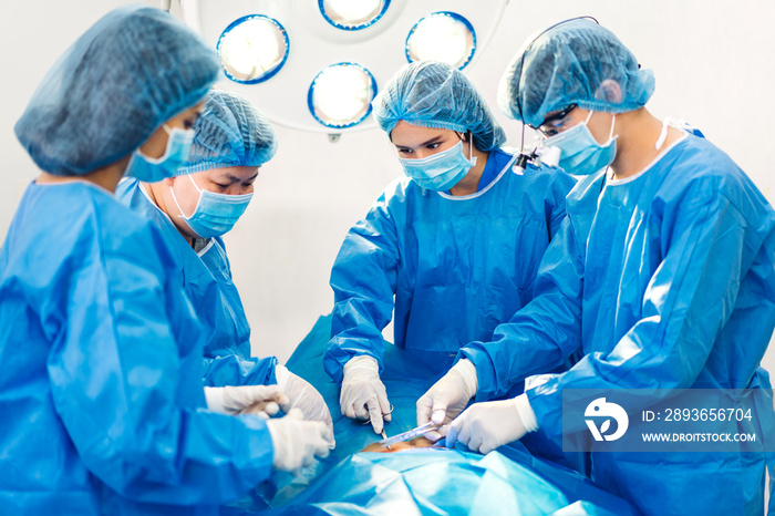 Professional anesthesiologist doctor medical team and assistant preparing patient to gynecological s