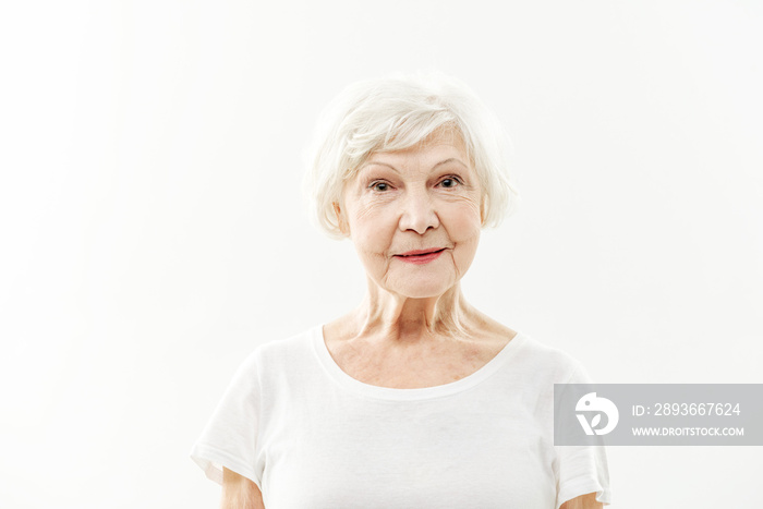 Joyful senior lady expressing positive emotions