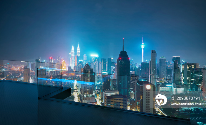 Open roof top balcony with cityscapes night view .