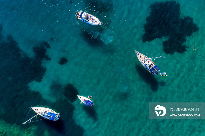 Aerial view of sail boats in front of Aliki beach at Thassos island, Greece