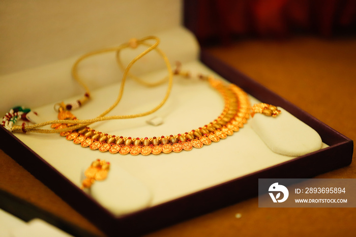 Gold jewelry in box , Necklace